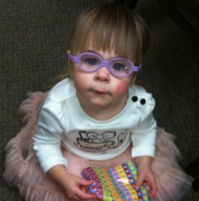 18 month old girl wearing glasses