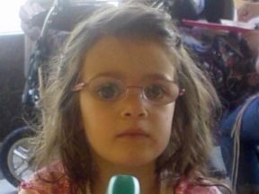 picture of a 3 year old girl wearing glasses