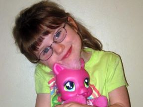 picture of 4 year old girl wearing glasses