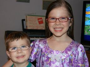 siblings wearing glasses