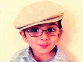 young boy in glasses