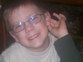 picture of a 5 year old boy in glasses