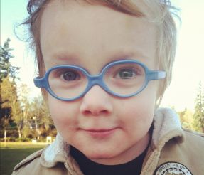 toddler boy in glasses