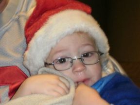 picture of a young boy wearing glasses