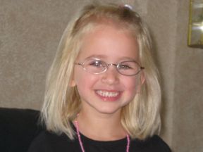 picture of a girl wearing glasses