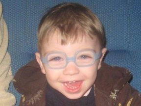 toddler boy wearing glasses.