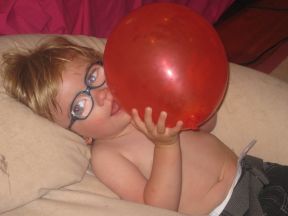 photo of a baby in glasses for cataracts