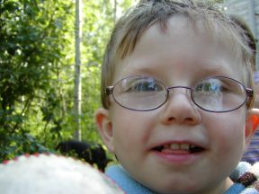 picture of 3 year old boy wearing glasses