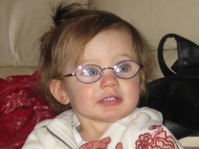 Makenna, 16 months. She wears glasses for farsightedness (+9 in each eye).