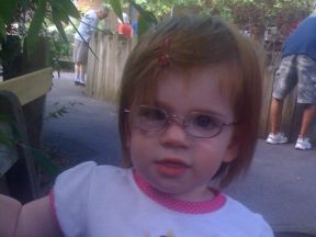 toddler girl wearing glasses for farsightedness