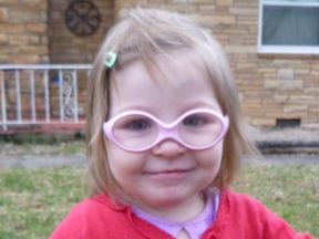 toddler wearing glasses
