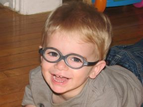 toddler boy in glasses