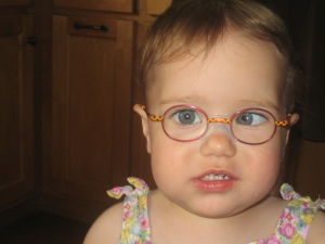 A picture of Zoe that triggers my guilt-reflex.  From May 2008.  I kept trying to convince myself that her eyes weren't crossing again, but it's clear looking back that they were.