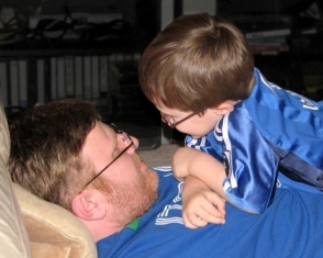 I see you, by Natalie.  Nicky wears glasses for extreme farsightedness.