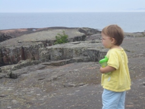 Zoe looks out over Lake Superior
