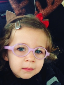 photo of girl in pink glasses